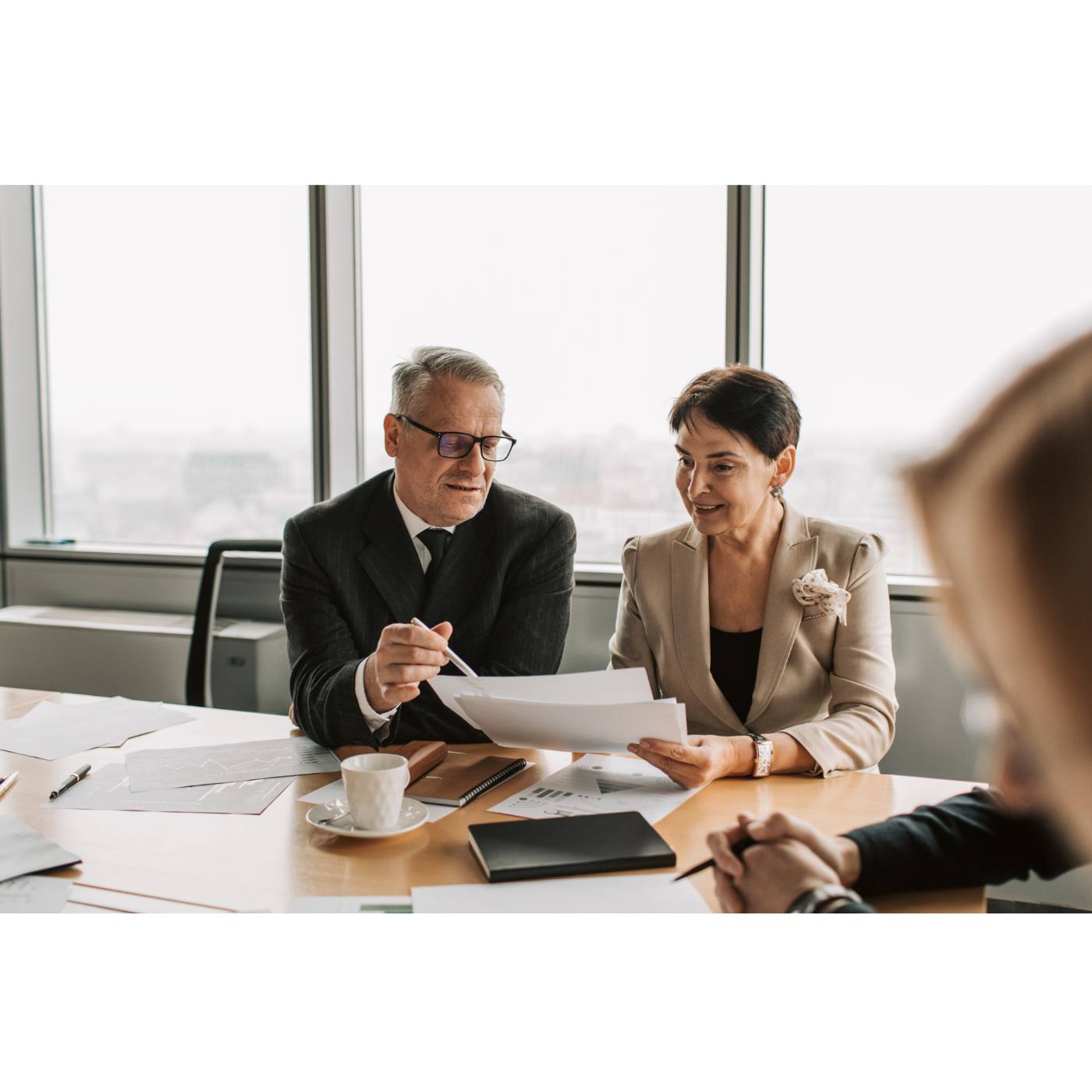 Two consultants reviewing a candidate profile at the VPMC talent desk